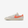 Nike "Blazer Low '77 PRM" M - Summit White / Safety Orange